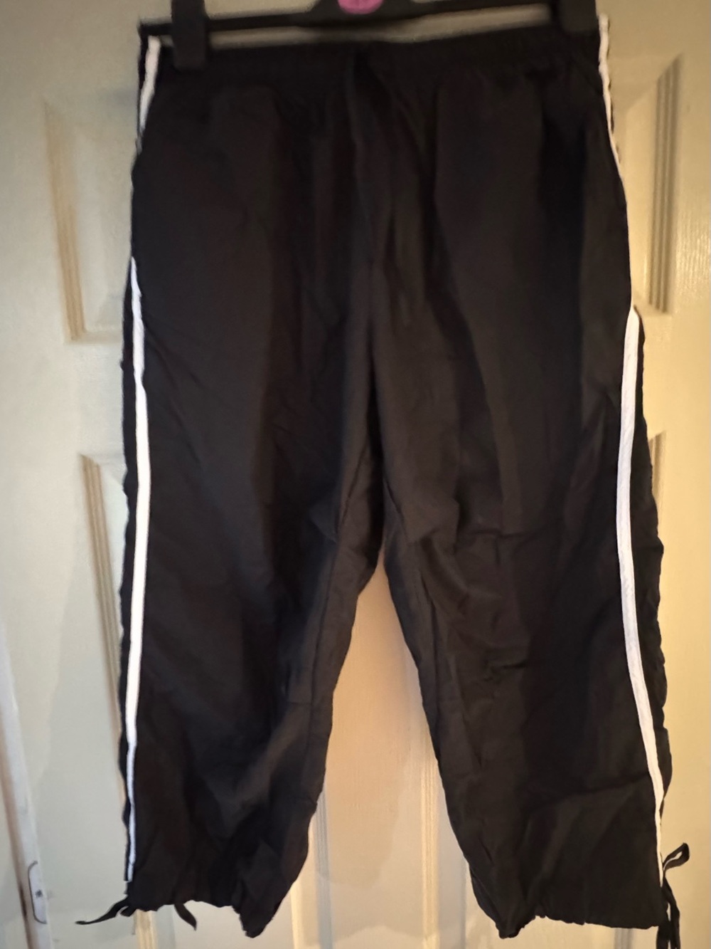 Fashion Nova Black parachute with drawstring White Side Stripes